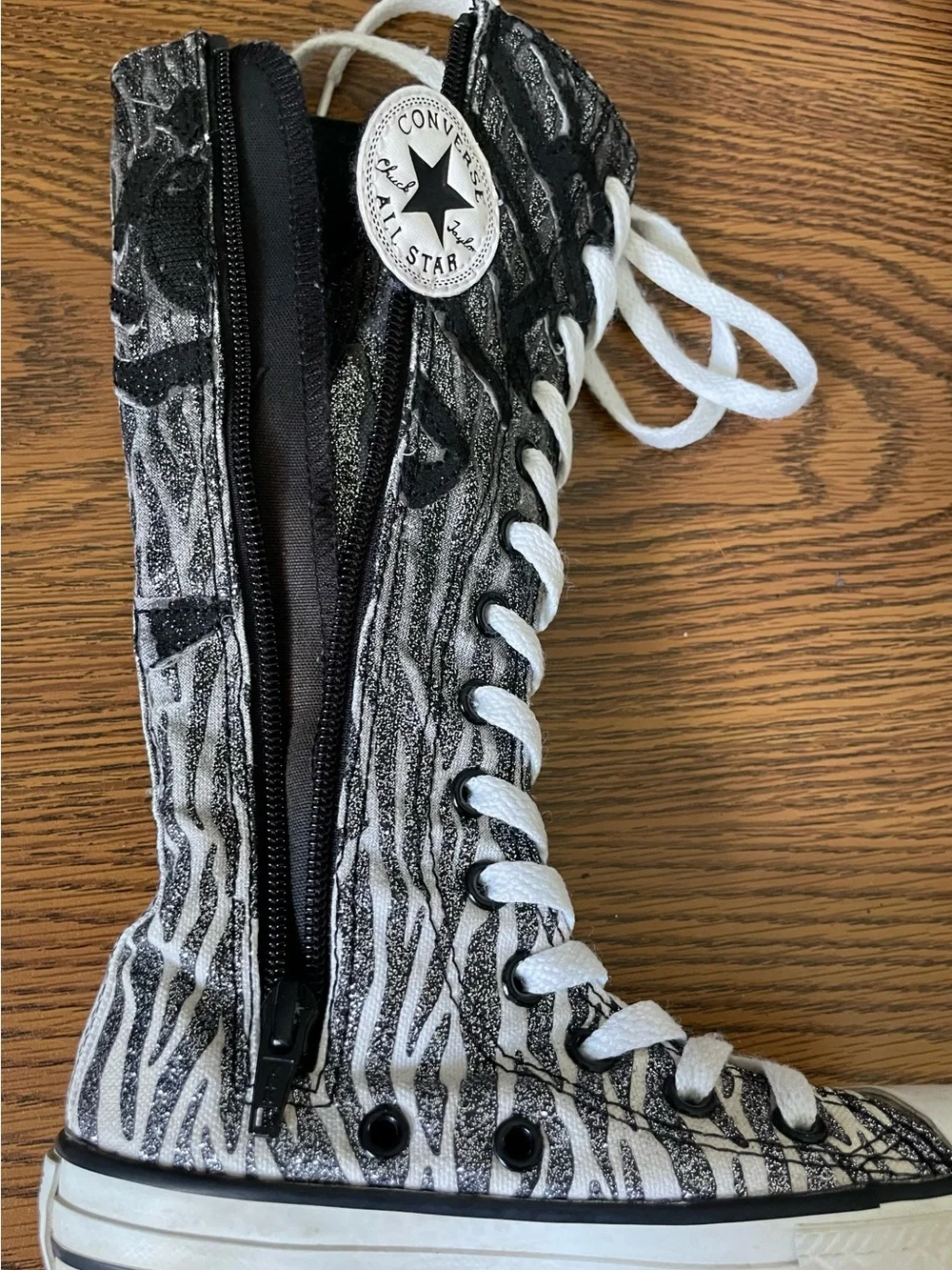 High-Top Zebra Print Lace-Up Sneakers in Black and White